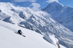 Me skiing above Sealy Tarns with Aoraki / Mount Cook in the background. PC Beau Fredlund